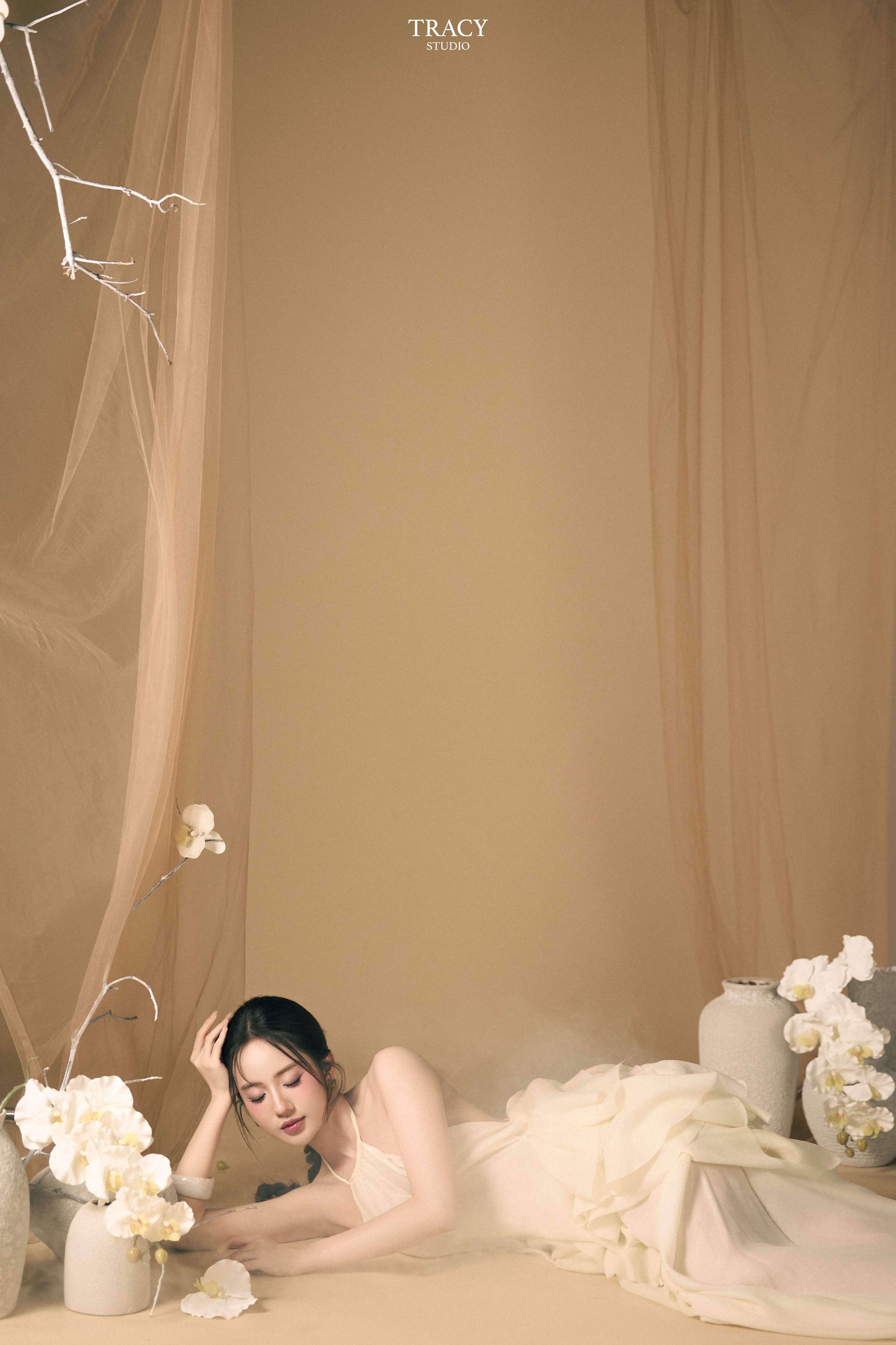 frontend/img/gallery/anh-tet-yem-ao-dai/tracy-studio-chup-concept-yem-tet-van-khe (3).jpg